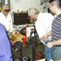 Visitors look at Dorian plant