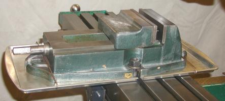 Mill vice drip pan use